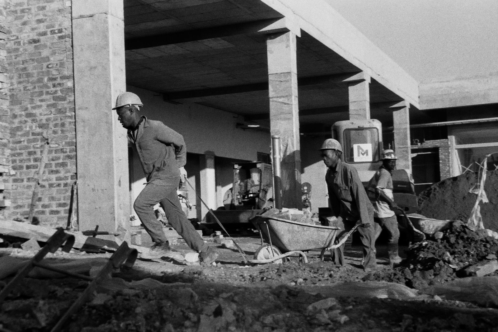 Construction workers building a structure in Johannesburg